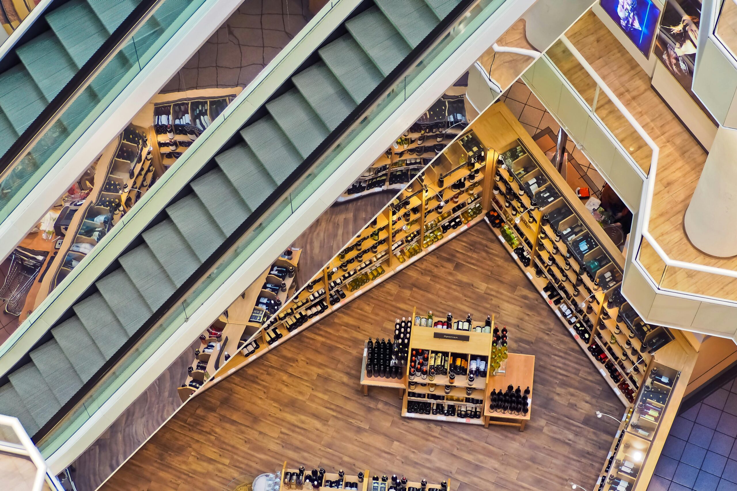 Image of wooden flooring in wine shop illustrating Holmes Noble case study for Amtico